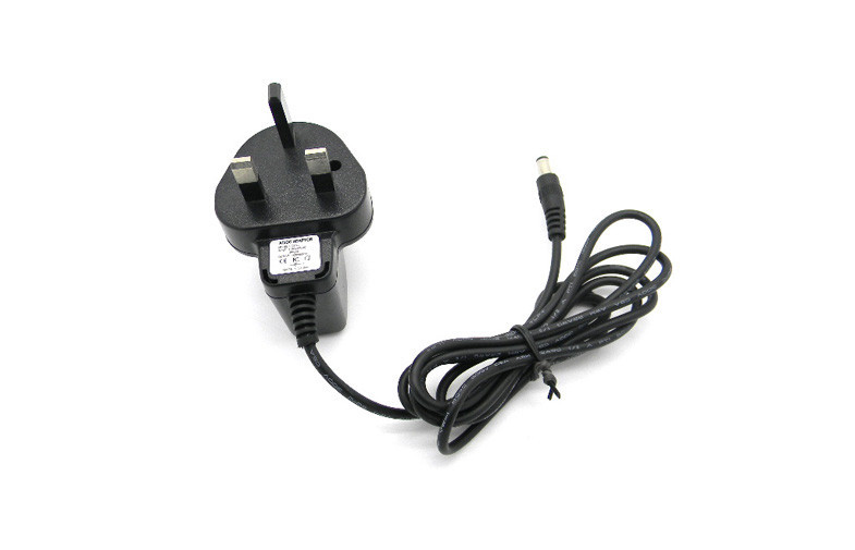 DC6V 500mA Switching Dinding Power Adapter Over Voltage Dengan UK Plug